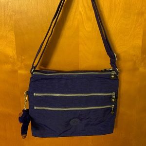 Kipling triple zip blue midsized crossbody handbag